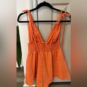 V-Neck Tie Shoulder Romper. NEW. TAG INTACT. Size Medium.